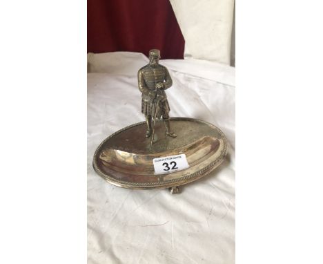  Sale Item:    PLATED KILTED FIGURE DESK TRAY (AF)  Vat Status:   No Vat   Buyers Premium:  This lot is subject to a Buyers P