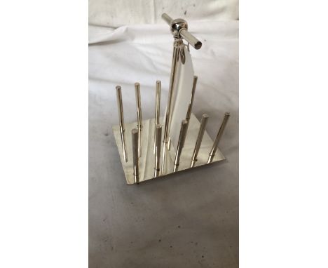  Sale Item:    CHRISTOPHER DRESSER STYLE TOAST RACK  Vat Status:   No Vat   Buyers Premium:  This lot is subject to a Buyers 