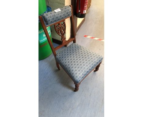  Sale Item:    UPHOLSTERED LOW CHAIR ON WHEELS   Vat Status:   No Vat   Buyers Premium:  This lot is subject to a Buyers Prem