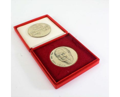 Two large German medallions, one depicting Wilhelm Pieck 1876-1960, the other with depiction of the Brandenburg Gate, 5.5cm d