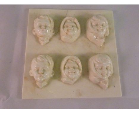 ROYAL WORCESTER PORCELAIN MOULD FOR FIGURE FACES WITH 6 DIFFERENT FACES, (SLIGHT CRACK)