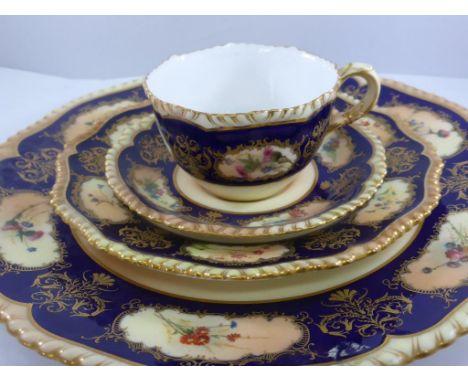 SUPERB ROYAL WORCESTER COBALT BLUE AND GILT TEA SERVICE WITH PAINTED FLORAL DECORATION COMPRISING 8 TEA CUPS AND 9 SAUCERS, 9
