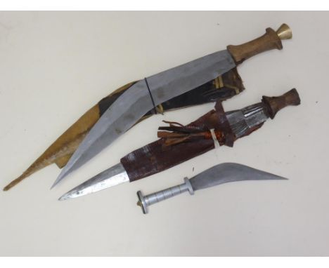 3 MISC. AFRICAN KNIVES, ONE WITH HIDE SCABBARD, ONE WITH SNAKESKIN AND ONE WITHOUT SCABBARD LABELLED AFAR TRIBE