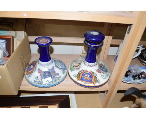 TWO WADE DECANTERS OF NELSONS BRITISH NAVY PUSSERS RUM, ONE FULL AND SEALED