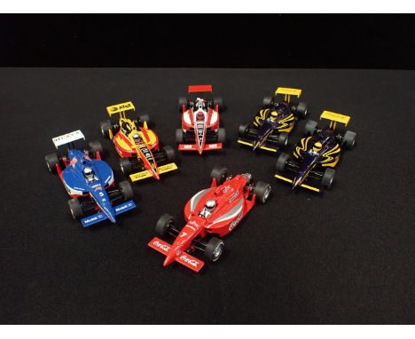 SIX UNBOXED SCALEXTRIC 'INDY' RACING CARS&nbsp;Some shown signs of light use but good condition (some damage), different desi