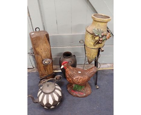 A PLASTER ADVERTISING HEN; 'NEW LAID EGGS'44cm high (repaired), with a decorative amphora on stand, a wooden beam candle hold