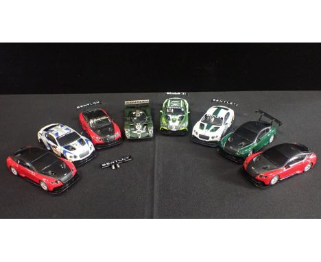 EIGHT UNBOXED SCALEXTRIC 'BENTLEY' RACING CARSIn used condition, some with slight damage. Cars include Bentley Continental (8