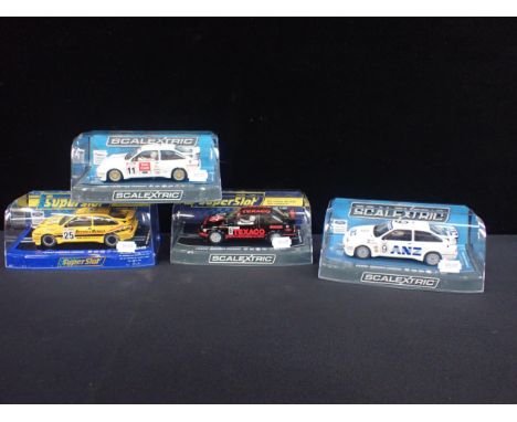 FOUR BOXED SCALEXTRIC 'FORD SIERRA RS500' CARSall boxed and in good condition. Including C3738 Ford Sierra RS500 'Steve Soper