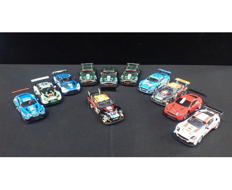 ELEVEN UNBOXED SCALEXTRIC 'ASTON MARTIN' RACE CARS&nbsp;Different styles and designs,&nbsp; some shown signs of light use but