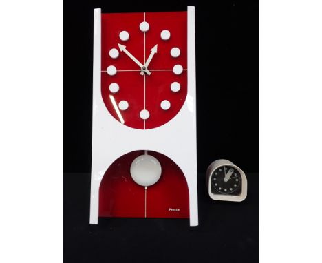 PRESTA, JAPAN; A RETRO 1970s RED AND WHITE PERSPEX WALL CLOCKwith battery movement 44 x 21cm, and a 1970s Ritz-Italora alarm 