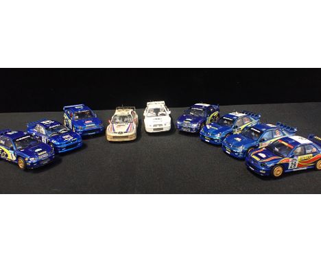 NINE UNBOXED SCALEXTRIC 'SUBARU IMPREZA' CARS&nbsp;Some shown signs of light use but good condition, in a number of different