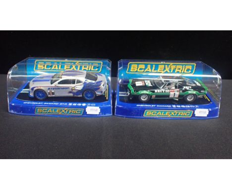 TWO BOXED SCALEXTRIC 'CHEVROLET CAMARO' CARSboth boxed and in good condition. Including C3612 '1970 Faberge Racing No.1'. (2)