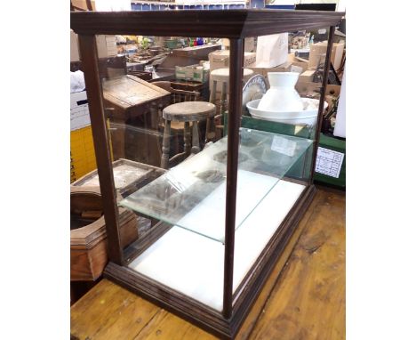 AN EARLY 20th CENTURY MAHOGANY FRAMED SHOP DISPLAY CABINET82cm wide (for spares or restoration; sliding doors, one shelf and 