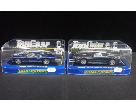 TWO BOXED SCALEXTRIC 'TOP GEAR CARS'both boxed and in good condition. Aston Martin DBS and Ford GT. (2)