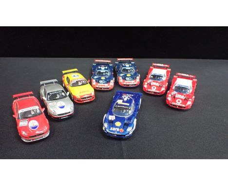 EIGHT UNBOXED SCALEXTRIC 'MASERATI' RACE CARS&nbsp;Some shown signs of light use but good condition, in different designs and
