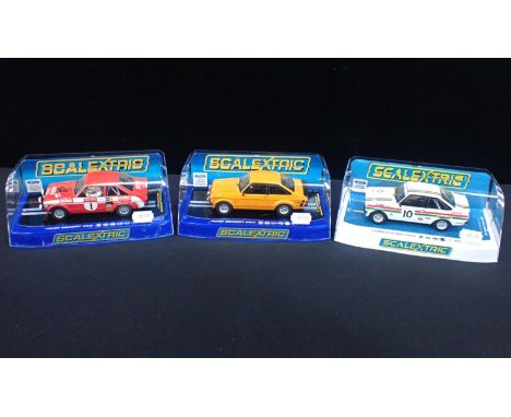 THREE BOXED SCALEXTRIC 'FORD ESCORT MK2' CARSall boxed and in good condition. Including C3426 Ford Escort MKll 'Mexico' Limit