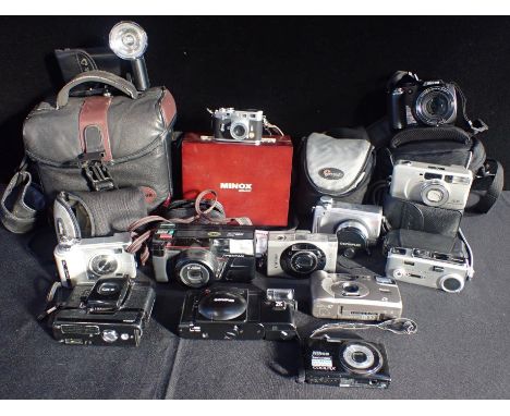 A MINOX 'DCC LEICA M3' DIGITAL CAMERAwith case, box and instructions and a selection of digital cameras