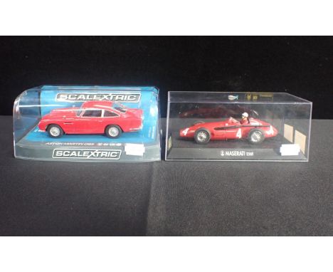 TWO BOXED SCALEXTRIC CARS'Maserati 250F' and 'Aston Martin DB5' both boxed and in good condition. (2)