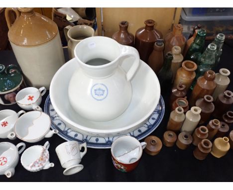 A  WASHSTAND JUG FROM 'KING'S ARMS HOTEL, PUDDLETOWN, DORSET'with associated basin, a collection of invalid feeders, , a 'BOV