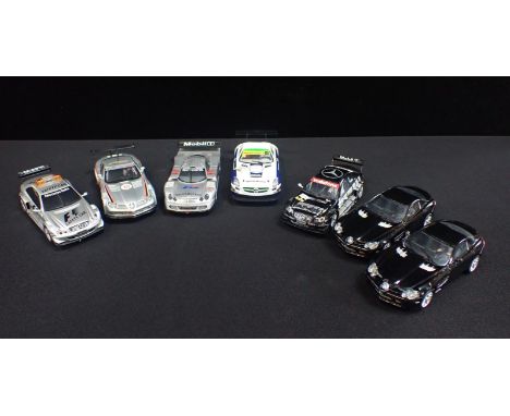 SEVEN UNBOXED SCALEXTRIC 'MERCEDES' CARSincluding 'CLK LM', 'SLS AMG GT3' and 'SLR McLaren 722 GT'. Some shown signs of light
