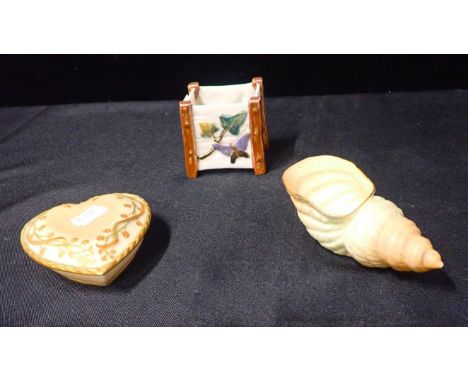 A ROYAL WORCESTER BLUSH IVORY PORCELAIN HEART SHAPED TRINKET BOX2.5cm high x 10cm x 9cm, a ditto shell shaped bowl and a Roya