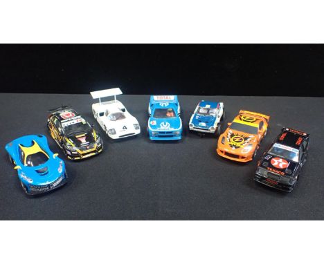 SEVEN UNBOXED SCALEXTRIC RACING CARS&nbsp;Including 'Fait Abarth 124', 'Lancia Rally 037' and 'Chaparral 2F'. All cars are un