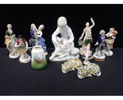 A COLLECTION OF CONTINENTAL CERAMICSincluding seven 18th century style figure models, a Lladro style seated girl, a pair of c