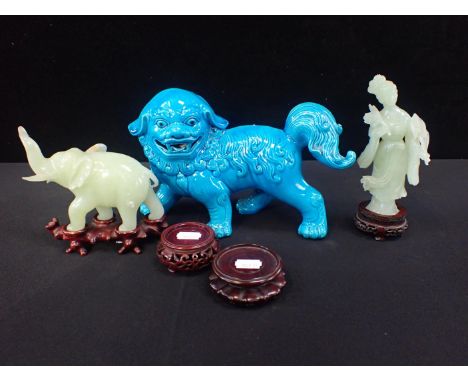 A CHINESE JADE ELEPHANT, ON HARDWOOD STAND14.5cm high (a/f), a similar figure on stand 19cm high, a turquoise glazed temple l