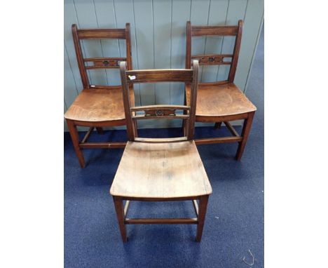 THREE EARLY 19th CENTURY EAST ANGLIAN DINING CHAIRSwith hollow seats and pierced horizontal splat with button turning, mixed 