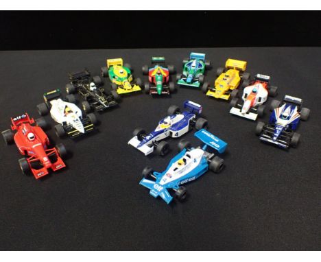 ELEVEN UNBOXED SCALEXTRIC VINTAGE 'F1' RACING CARS&nbsp;Including; Benetton, Lotus, McLaren, Minard and Tyrrell. Some shown s