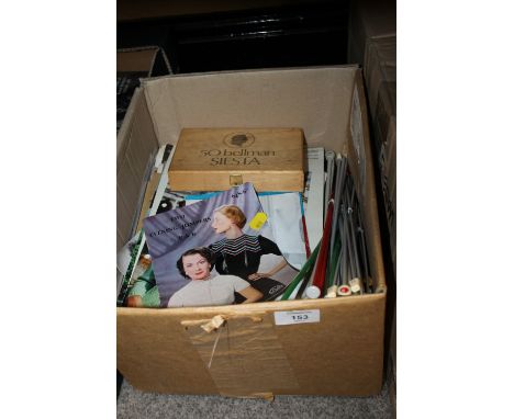 A BOX OF VINTAGE KNITTING PATTERNS, NEEDLES, HOOKS ETC.