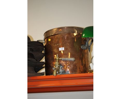 A VINTAGE COPPER TWIN HANDLED WATER STILL 