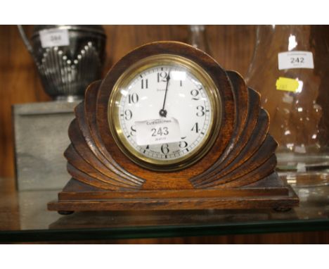 A VINTAGE FRENCH ART DECO OAK MANTLE CLOCK