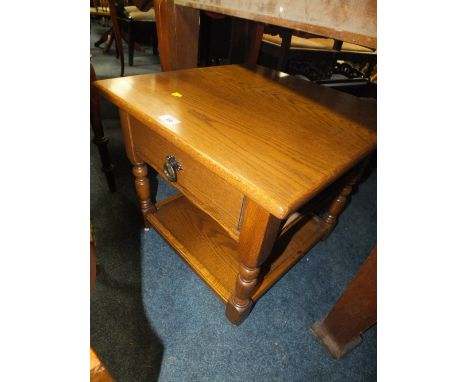 A REPRODUCTION OAK LAMP TABLE 