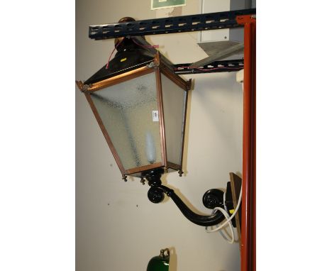 A CAST AND COPPER WALL MOUNTABLE STREET LAMP 