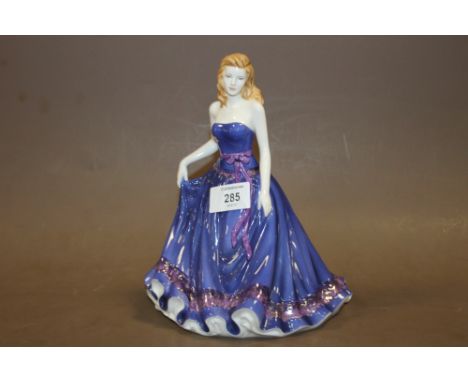 A ROYAL WORCESTER FAYE FIGURINE