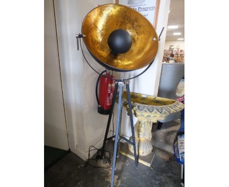 A MODERN FUNKY TRIPOD LAMP IN THE FORM OF A FLOODLIGHT