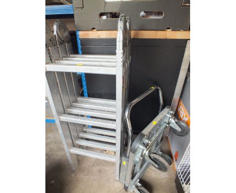 A FOLDING ALLOY LADDER AND A TROLLEY