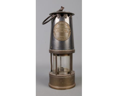 An Eccles Type SL Ministry of Power miner's lamp, by The Protector Lamp and Lighting Co Ltd.