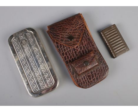 A Rolls Razor set in leather faux crocodile skin case along with a bakelite vesta case