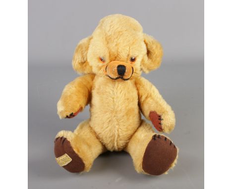 A vintage Merrythought mohair jointed bear, Cheeky. Seated height 22cm.