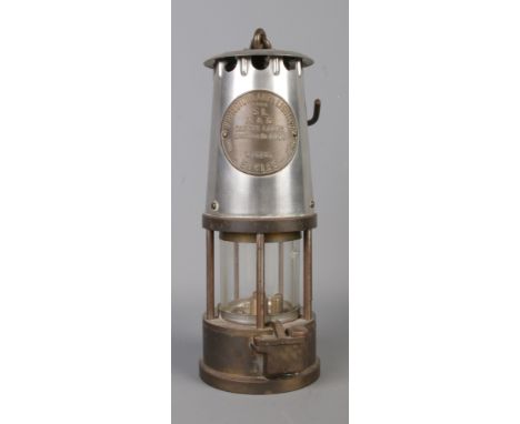 An Eccles Type SL M&amp;Q miner's safety lamp, by The Protector Lamp and Lighting Co Ltd.