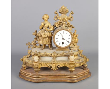 Phillipe H. Mourey (1840-1910) late 19th century gilt spelter and alabaster figurative mantle clock. Decorated in the rococo 