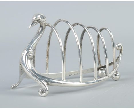 A Victorian silver five bar toast rack modelled as a swan. Assayed Birmingham 1899 by William Hutton &amp; Sons Ltd. Length 1
