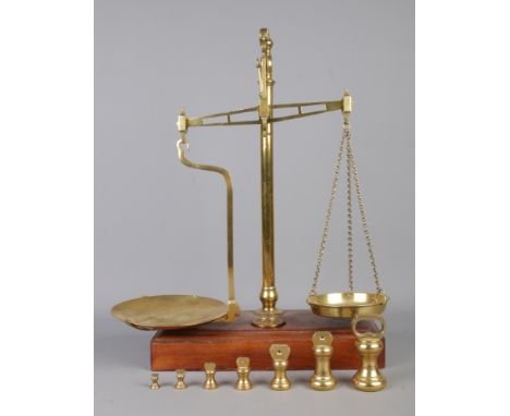 A set of Day and Millward balance scales, complete with a harlequin set of weights, including Avery examples.