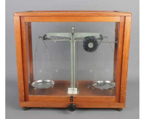 A Stanton 250g scientific chemical scales in mahogany glazed case.
