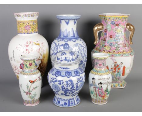 A collection of oriental style ceramics, including large hexagonal vase, blue &amp; white vase, along with two smaller famill
