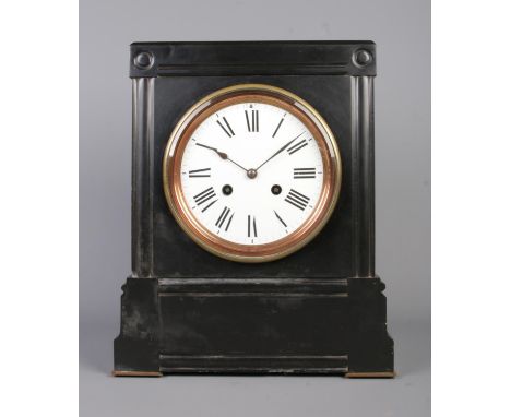 A 19th century French eight day slate mantel clock. Having enamel dial, Roman numeral markers and Samuel Marti movement. Chim