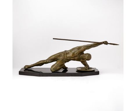 20th centuryThe seminude muscular gladiator holding a spear and a shield, mounted on a shaped polished black marble base, ins
