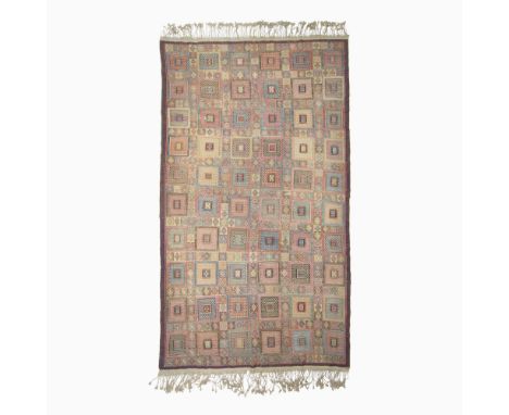 East Anatolia, late 19th centuryWith a polychrome tile pattern overall, within a reciprocal trefoil border.(10' 7" x 6' 6")Ar